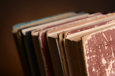 Old books on brown backgroundの写真素材