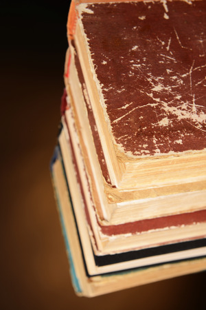 Old books on brown backgroundの写真素材