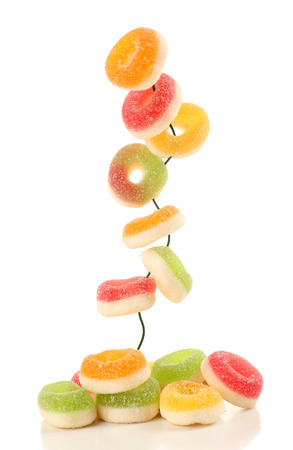 Jelly circles on wire isolated on whiteの写真素材