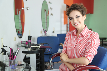 Beautiful young woman in beauty salonの写真素材
