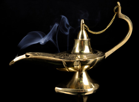 Magic lamp isolated on blackの写真素材