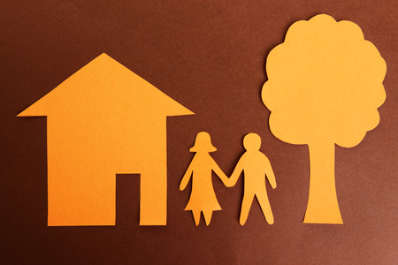 Paper family on brown backgroundの写真素材