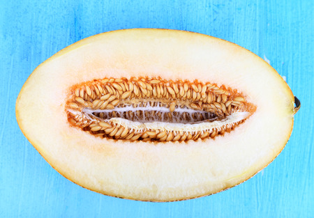 Ripe melons on wooden table close-upの写真素材