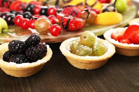 Fresh berries dessert for healthy snack on wooden table close upの写真素材