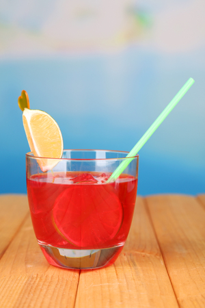 Tasty cocktail on swimming pool backgroundの写真素材
