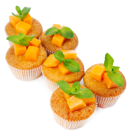 Tasty pumpkin muffins, isolated on whiteの写真素材