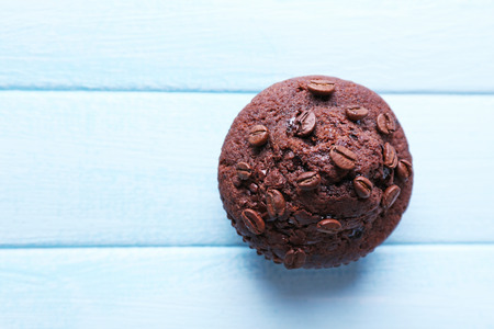Chocolate muffin on wooden backgroundの写真素材