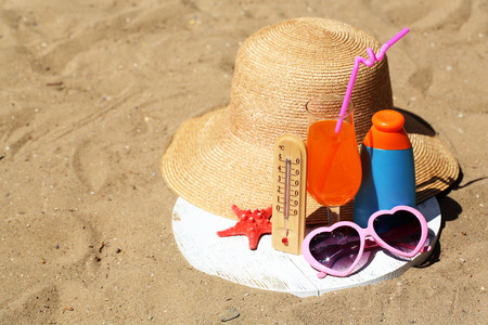 Thermometer in sand close-upの写真素材