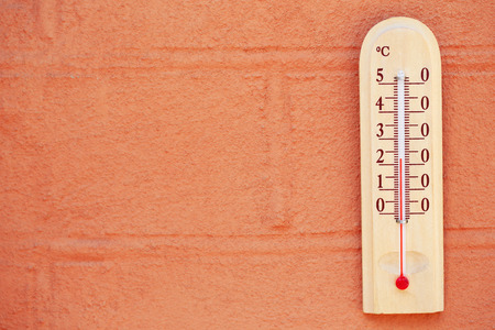 Thermometer on wall outsideの写真素材