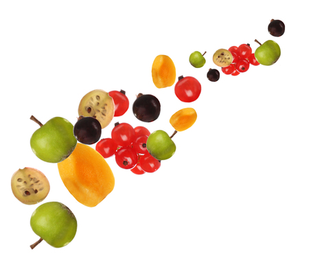 Fresh fruit skewers isolated on whiteの写真素材
