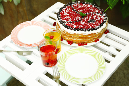 Tasty cake with fresh berries on table, close up