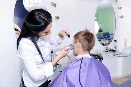 Young man in beauty salonの写真素材