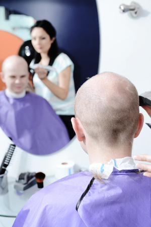 Young man in beauty salonの写真素材
