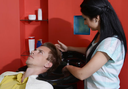 Young man in beauty salonの写真素材