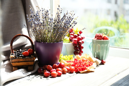 Still life with berries and flowersの写真素材