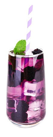 Tasty cool blackberry lemonade with ice, isolated on whiteの写真素材