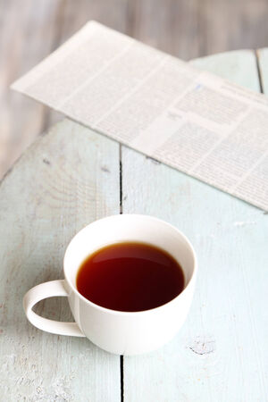 Cup of tea on wooden table, outdoorsの写真素材