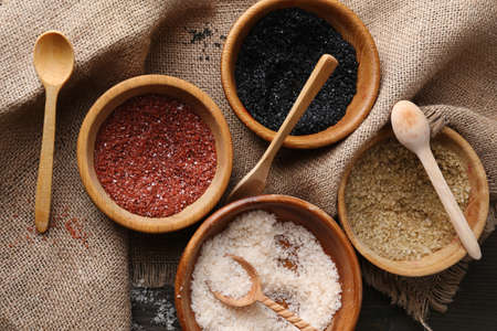 Different sea salt in bowls, close upの写真素材
