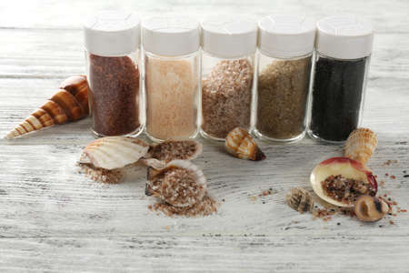 Different sea salt in bottles, close upの写真素材