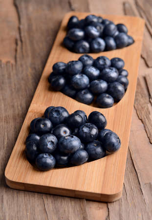 Delicious blueberries on table close-upの写真素材