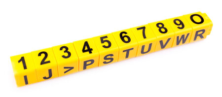 Educational cubes with different numbers isolated on whiteの写真素材