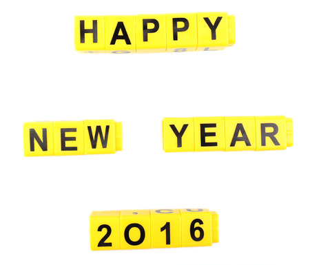 Happy New Year word formed by educational cubes, isolated on whiteの写真素材