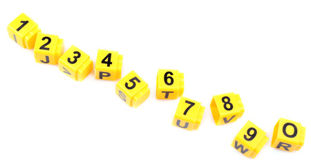 Educational cubes with different numbers isolated on whiteの写真素材