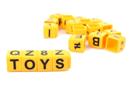 Educational cubes with different letters and numbers isolated on whiteの写真素材