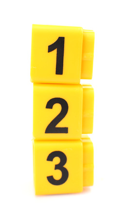 Educational cubes with different numbers isolated on whiteの写真素材