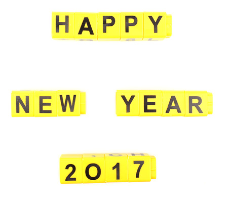 Happy New Year word formed by educational cubes, isolated on white