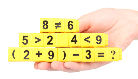 Educational cubes with different numbers isolated on white