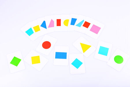 Educational cards with color geometric shapes, isolated on whiteの写真素材