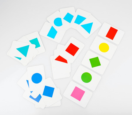 Educational cards with color geometric shapes, isolated on whiteの写真素材
