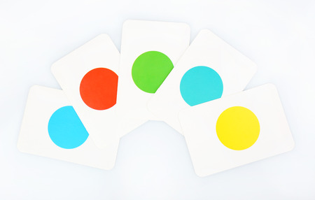 Educational cards with color geometric shapes, isolated on whiteの写真素材