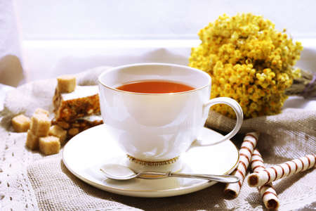 Cup of tea on table, close up