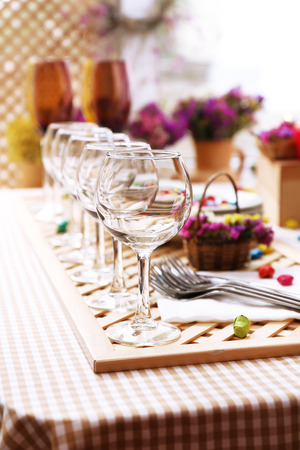 Buffet table with dishware waiting for guestsの写真素材