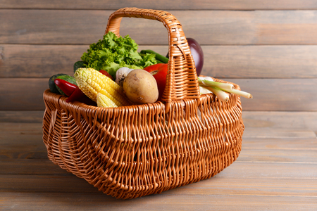 Fresh organic vegetables on wooden backgroundの写真素材