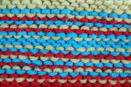 Knitted fabric background close up