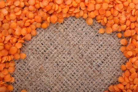 Lentil on sackcloth backgroundの写真素材