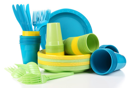 Bright plastic disposable tableware isolated on whiteの写真素材