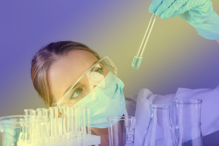 Laboratory assistant making medical test in laboratoryの写真素材