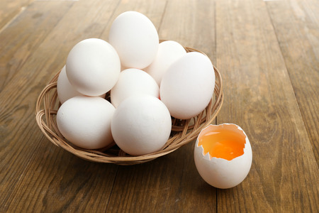 Eggs on wooden table close-up