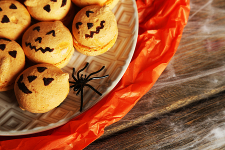 Composition for Halloween with sweets on wooden tableの写真素材