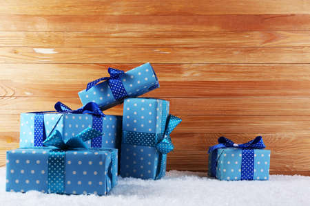 Gift boxes on wooden background