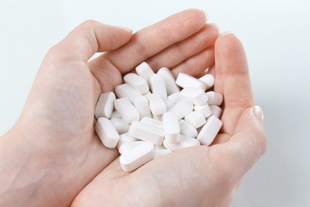 Pills in hand, close-up