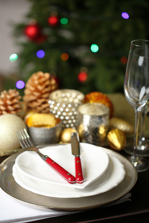 Serving Christmas table in roomの写真素材