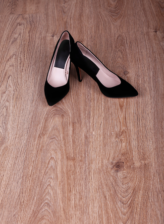 Women shoes on floor in roomの写真素材