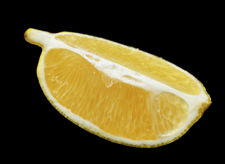 Lemon on black backgroundの写真素材