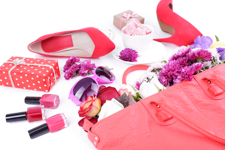 Women bag stuff top view isolated on whiteの写真素材