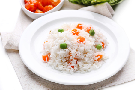 Vegetable rice served on table, close-upの写真素材